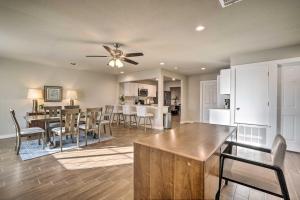 a kitchen and living room with a dining room and a dining table at San Antonio Home with Deck, 6 Mi to Downtown! in San Antonio