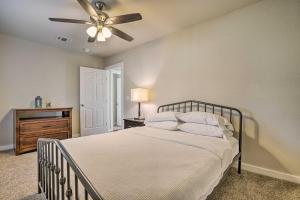 a bedroom with a bed and a ceiling fan at San Antonio Home with Deck, 6 Mi to Downtown! in San Antonio