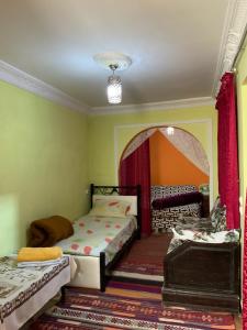 Letto o letti in una camera di House Naïma