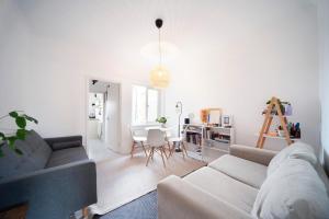 a living room with a couch and a table at 1Bed Flat - QUIET Nest - Green Lanes in London