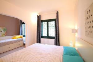 Posteľ alebo postele v izbe v ubytovaní Holiday Home Anais