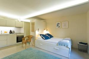 Kuchyň nebo kuchyňský kout v ubytování Oporto Cozy Flats + 26 fotografií