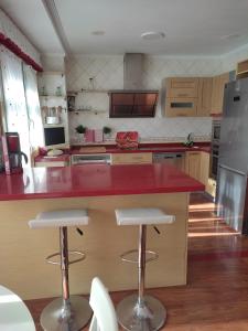 Kuchyňa alebo kuchynka v ubytovaní Duplex Boñar