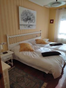 Posteľ alebo postele v izbe v ubytovaní Duplex Boñar