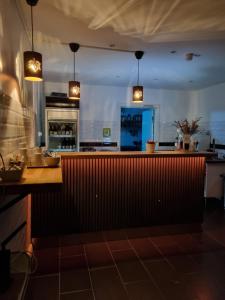 Kuchyň nebo kuchyňský kout v ubytování Gamla Järnhandeln - Norrskedika Hotell