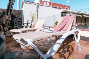 A balcony or terrace at Apartamento con encanto en patio sevillano (202)
