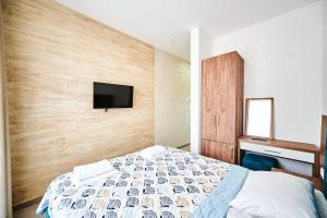 Hotel Halibas客房内的一张或多张床位