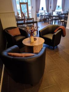 Posezení v ubytování Gamla Järnhandeln - Norrskedika Hotell