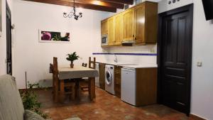 Kuchyň nebo kuchyňský kout v ubytování Casa del Molino