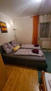 Postel nebo postele na pokoji v ubytování Ferienwohnung Korneuburg bei Wien