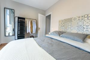 Cama o camas de una habitación en Entorno único a 2 minutos del mar con plaza de garaje