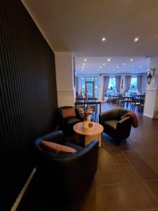 Posezení v ubytování Gamla Järnhandeln - Norrskedika Hotell
