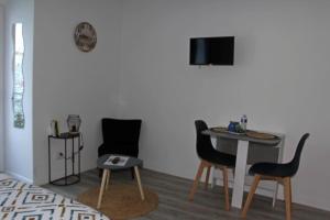 TV a/nebo společenská místnost v ubytování Location Tame