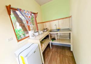 Eldhús eða eldhúskrókur á Cabinas Coco Alegre