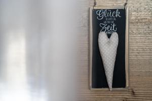 Certifikát, hodnocení, plakát nebo jiný dokument vystavený v ubytování Loft am See