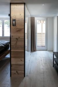 Postel nebo postele na pokoji v ubytování Loft am See