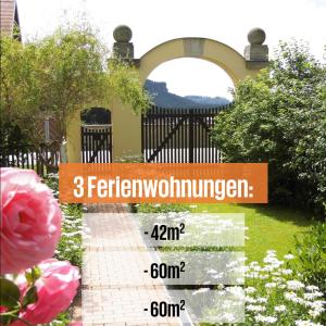 einen Garten mit einem Tor und einem Gehweg aus Ziegelsteinen in der Unterkunft Ferienwohnung Zum Lilienstein in Bad Schandau