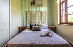 Letto o letti in una camera di Ruby 'n Emerald studio's