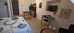 TV a/nebo společenská místnost v ubytování Location Tame