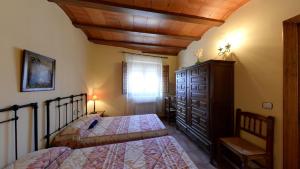 Postel nebo postele na pokoji v ubytování Casa Rural Las Tejas - Ideal para Familias y Grupos