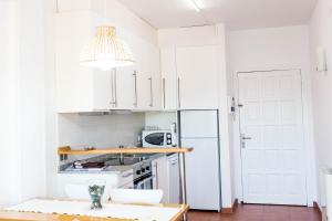 Kuchyň nebo kuchyňský kout v ubytování APARTAMENTO PIE DE PLAYA-Wifi free