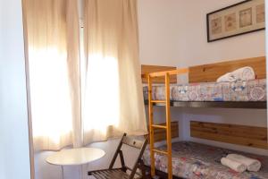 Postel nebo postele na pokoji v ubytování APARTAMENTO PIE DE PLAYA-Wifi free