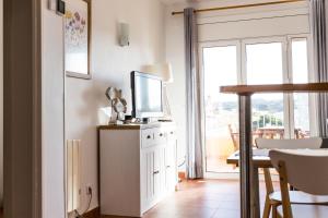 Kuchyň nebo kuchyňský kout v ubytování APARTAMENTO PIE DE PLAYA-Wifi free