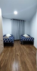 A bed or beds in a room at Acogedor Ático en Pleno Centro
