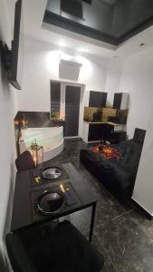 Posedenie v ubytovaní Apartament Czarny z Jacuzzi