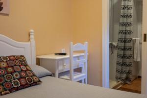 Postel nebo postele na pokoji v ubytování Sanvi Xerez Centro