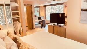 TV a/nebo společenská místnost v ubytování Hotel CityFlats