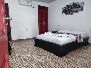Postel nebo postele na pokoji v ubytování Hotel Campo Verde