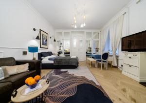 Телевизор и/или развлекательный центр в Apartament Żurawia street