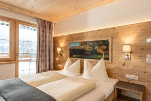 Postel nebo postele na pokoji v ubytování Pircherhof Appartements
