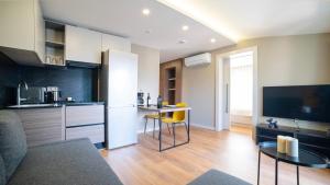 A kitchen or kitchenette at Vesta Rooms