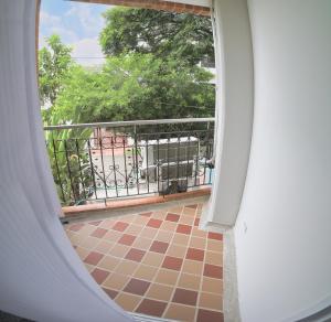 an open window with a view of a balcony at Edificio Vida Nueva in Cali