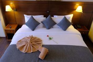 Een bed of bedden in een kamer bij Washington Hotel