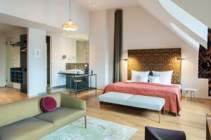 Postel nebo postele na pokoji v ubytování Emmerich Hotel Görlitz