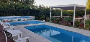 Πισίνα στο ή κοντά στο Casa con pileta San Luis Juana Koslay +2 φωτογραφίες