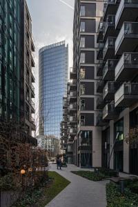 a group of tall buildings in a city at Mennica Residence Deluxe in Warsaw