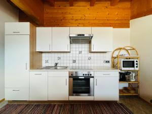 Kuchyň nebo kuchyňský kout v ubytování Apartment Oberhauserhof + 13 fotografií