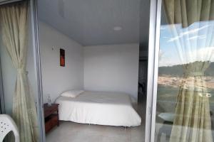 Postel nebo postele na pokoji v ubytování Casa turística Santa Helena y el Danubio