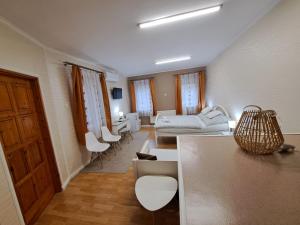 Posezení v ubytování Árkád Apartmanház Szeged