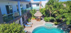 an aerial view of a resort with a swimming pool at Villas del Carmen Holbox in Holbox Island