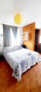 Postel nebo postele na pokoji v ubytování Cabañas Aire Marino Algarrobo + 37 fotografií