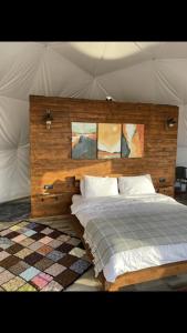 a bedroom with a large bed in a tent at Sapanca White Moon in Sapanca