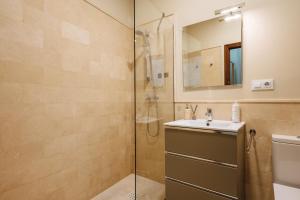 a bathroom with a shower and a sink at HomeySeville-Amazing Views Cathedral Tomas de Ibarra - 8 pax, Parking Optional in Seville +49 photos