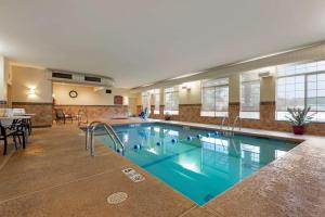 a large swimming pool in a hotel room at Best Western PLUS Vineyard Inn and Suites in Penn Yan