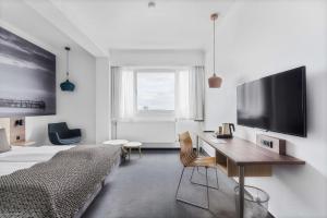 TV a/nebo společenská místnost v ubytování Best Western Plus Airport Hotel