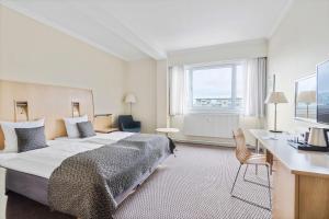 Postel nebo postele na pokoji v ubytování Best Western Plus Airport Hotel